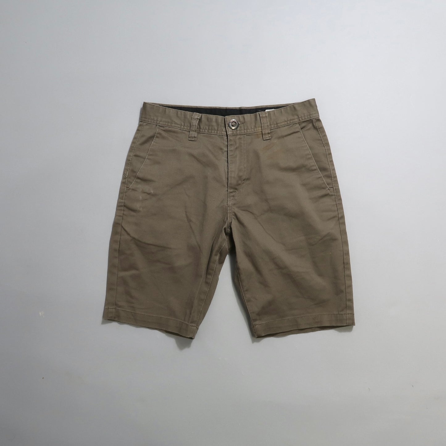 Khaki-colored shorts on a plain white background.