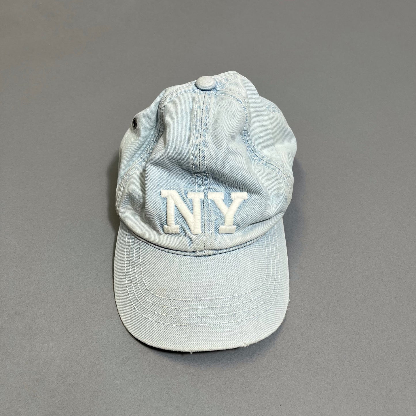 NY cap