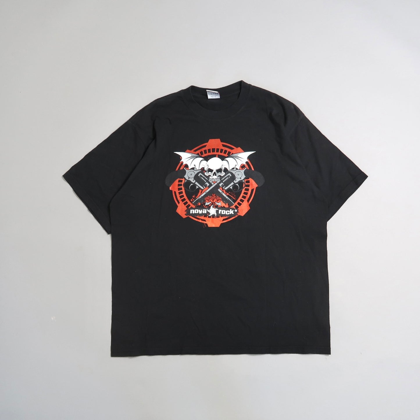 Black T-shirt with a skull and crossed guitars design.