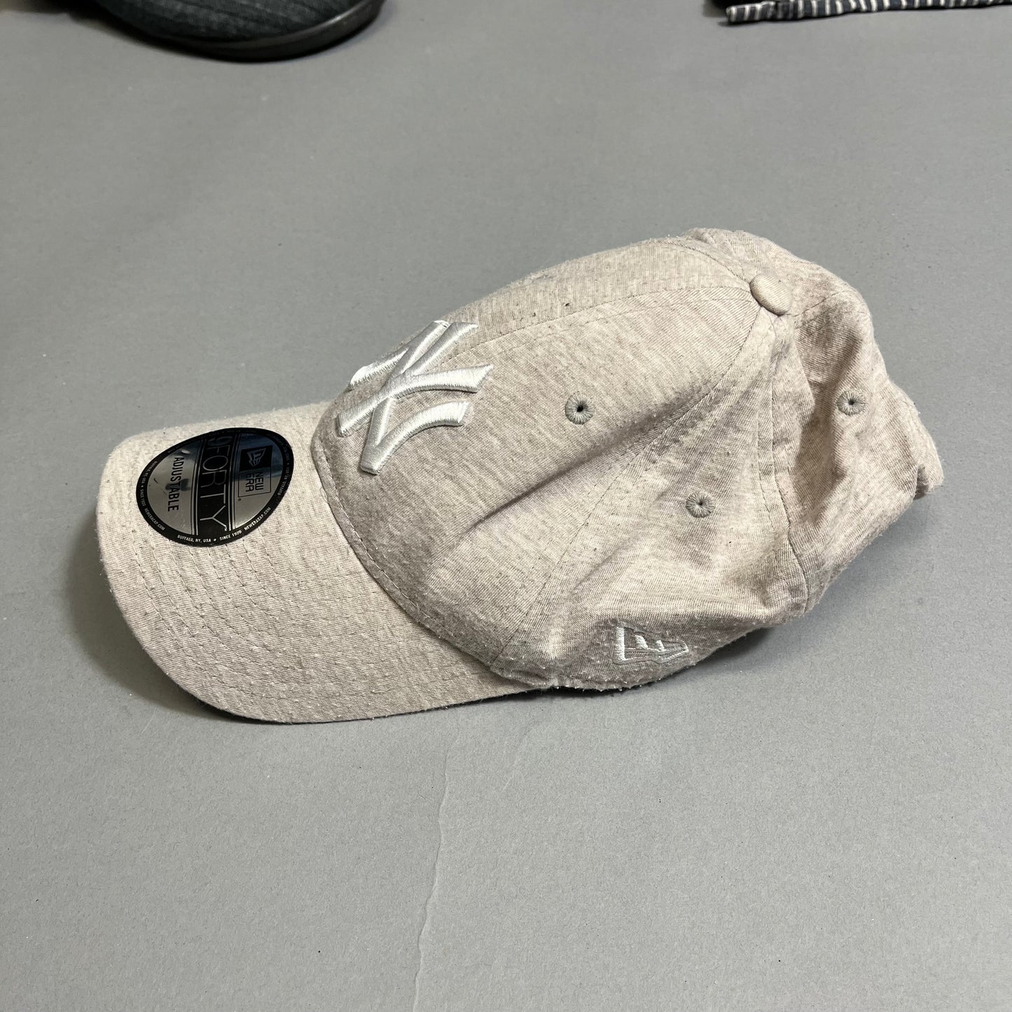 NY cap