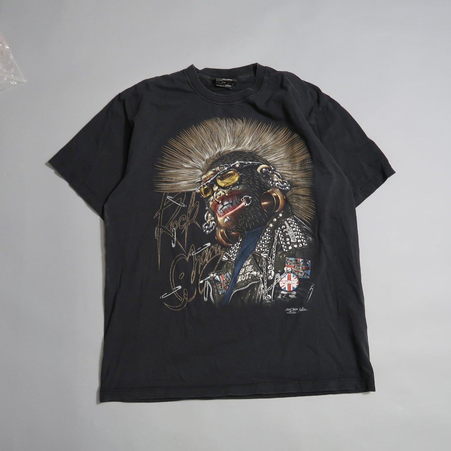 Black t-shirt with punk chimpanzee graphic and nullRock Starnull text.