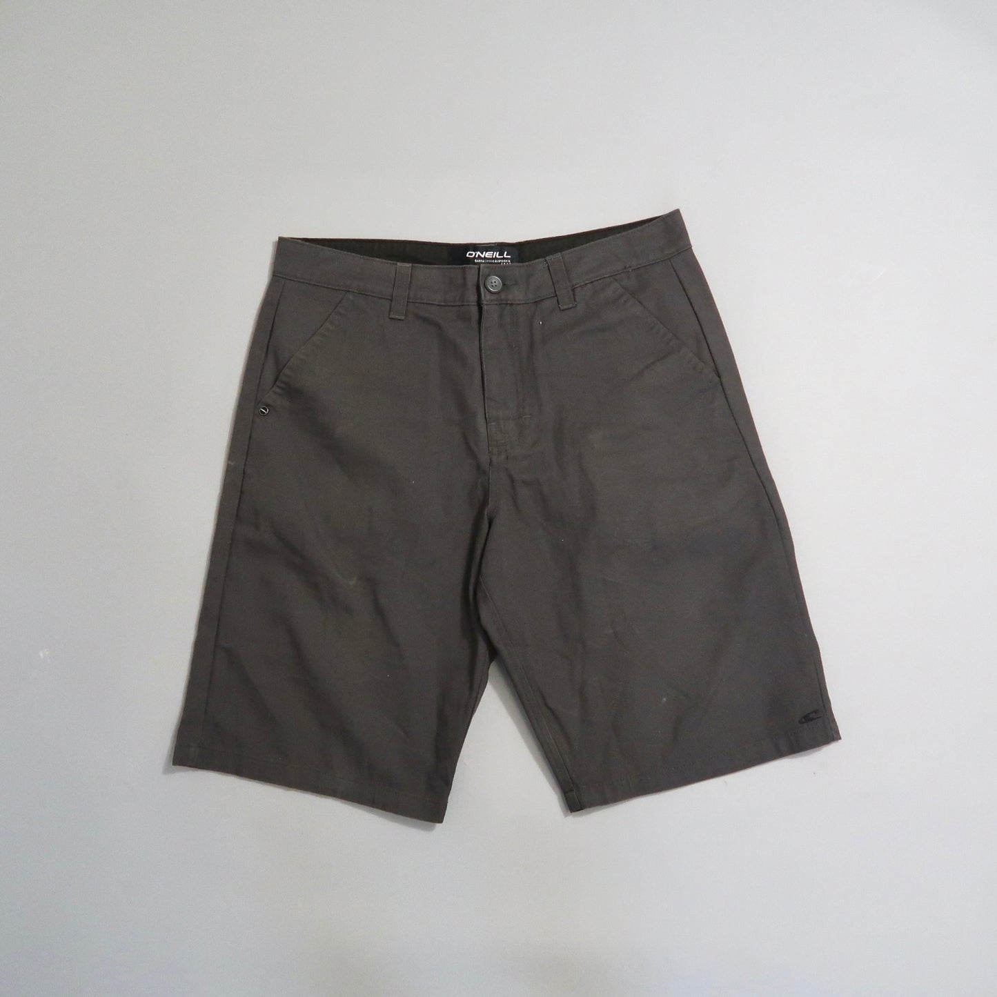 Dark gray knee-length O'Neill shorts on a light background.