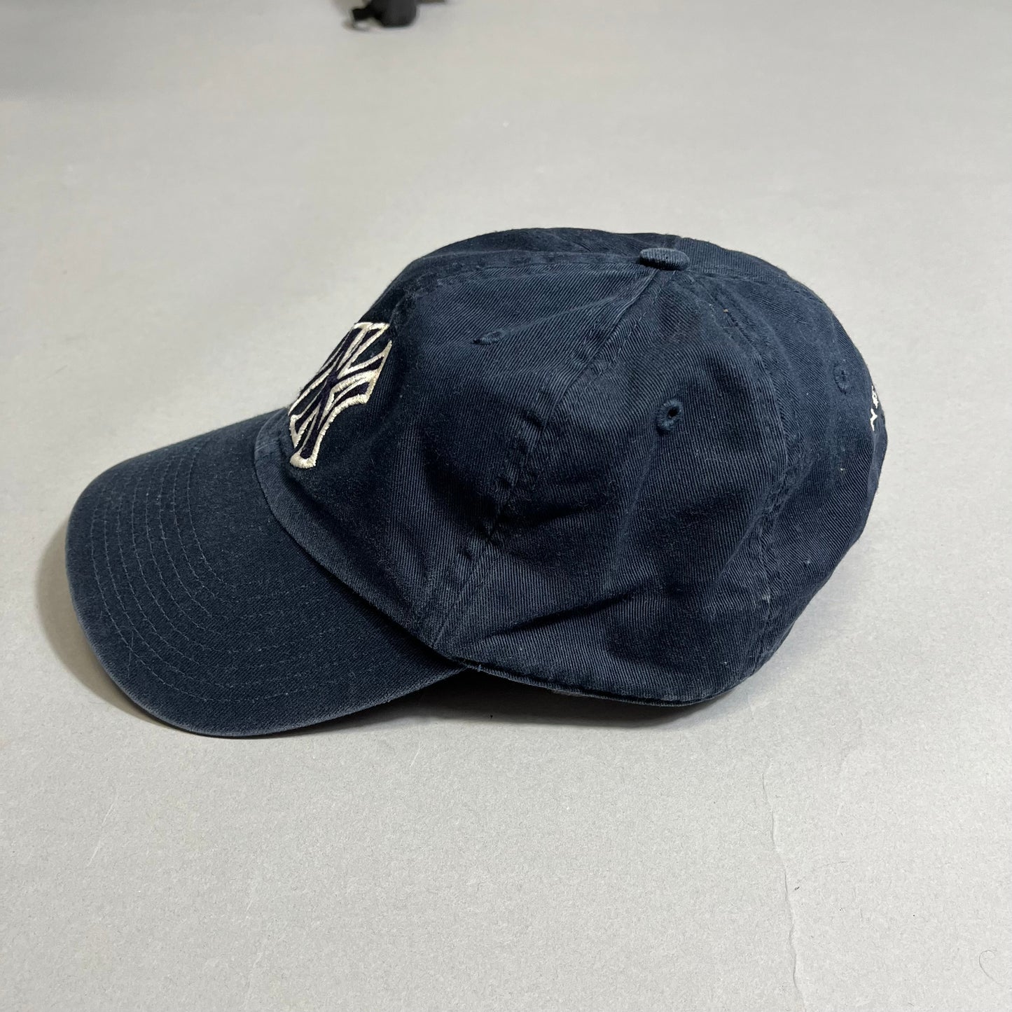 NY cap
