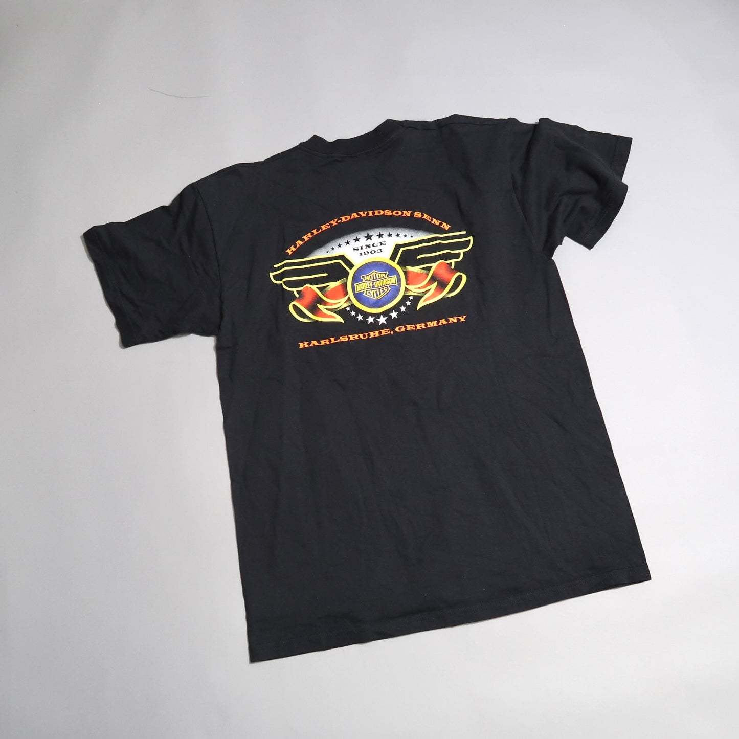 Black T-shirt with Harley-Davidson logo and Karlsruhe, Germany text.