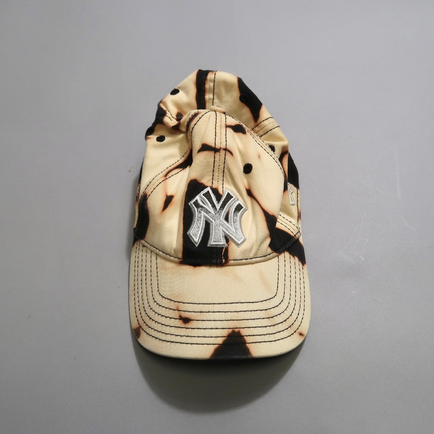NY bleached cap