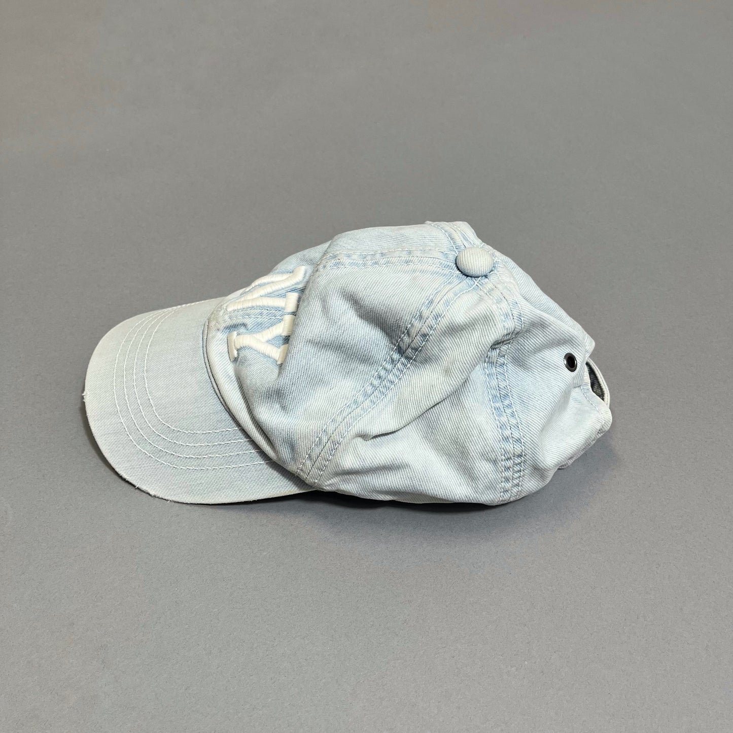 NY cap