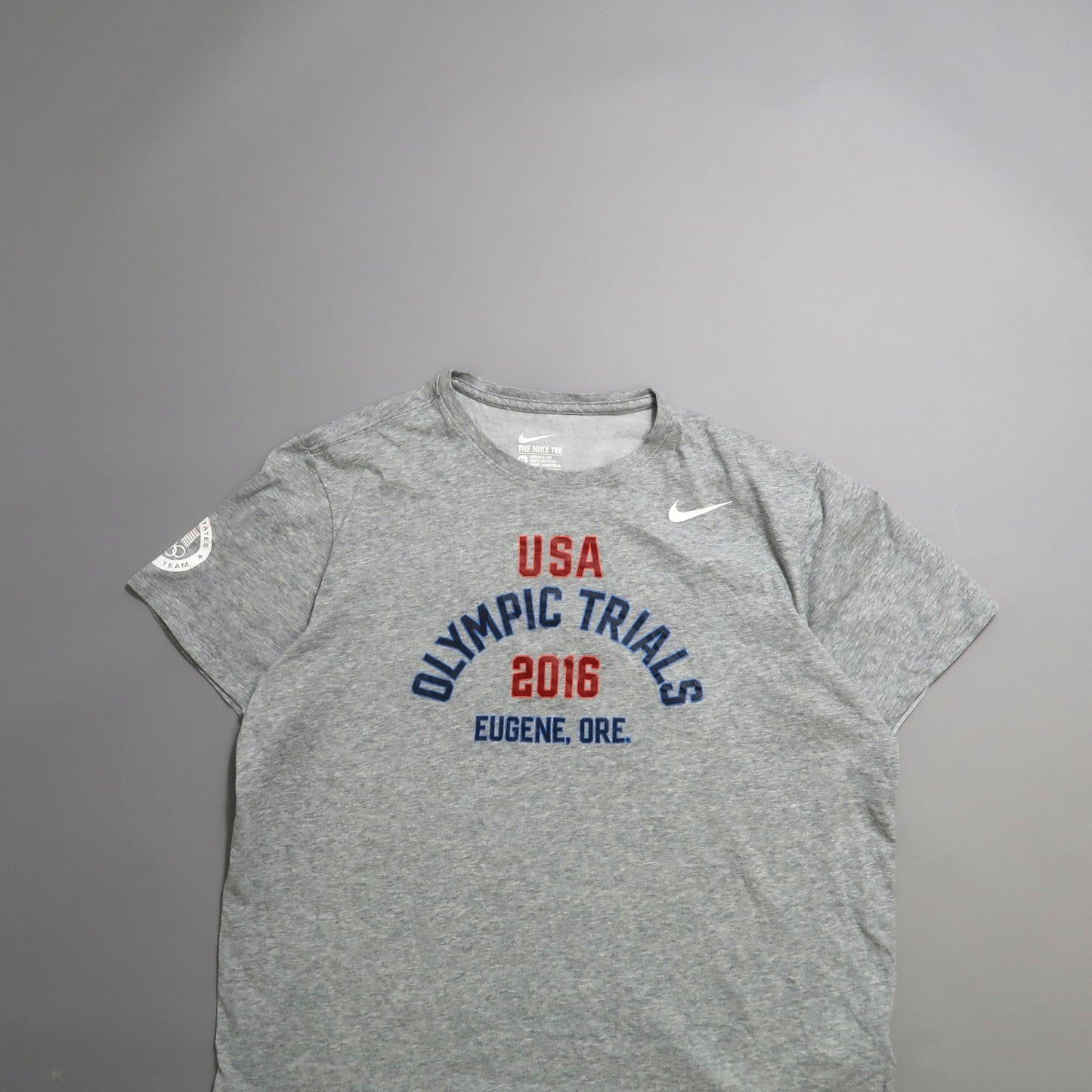 Gray nullUSA Olympic Trials 2016, Eugene, Ore.null T-shirt on gray background.