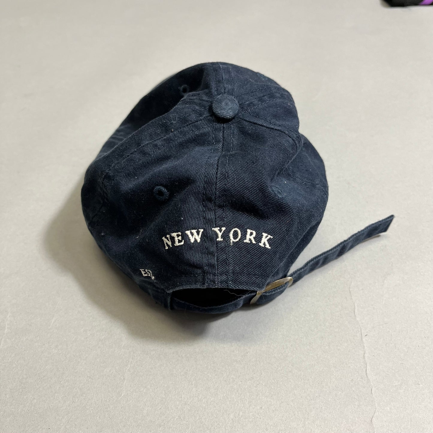 NY cap