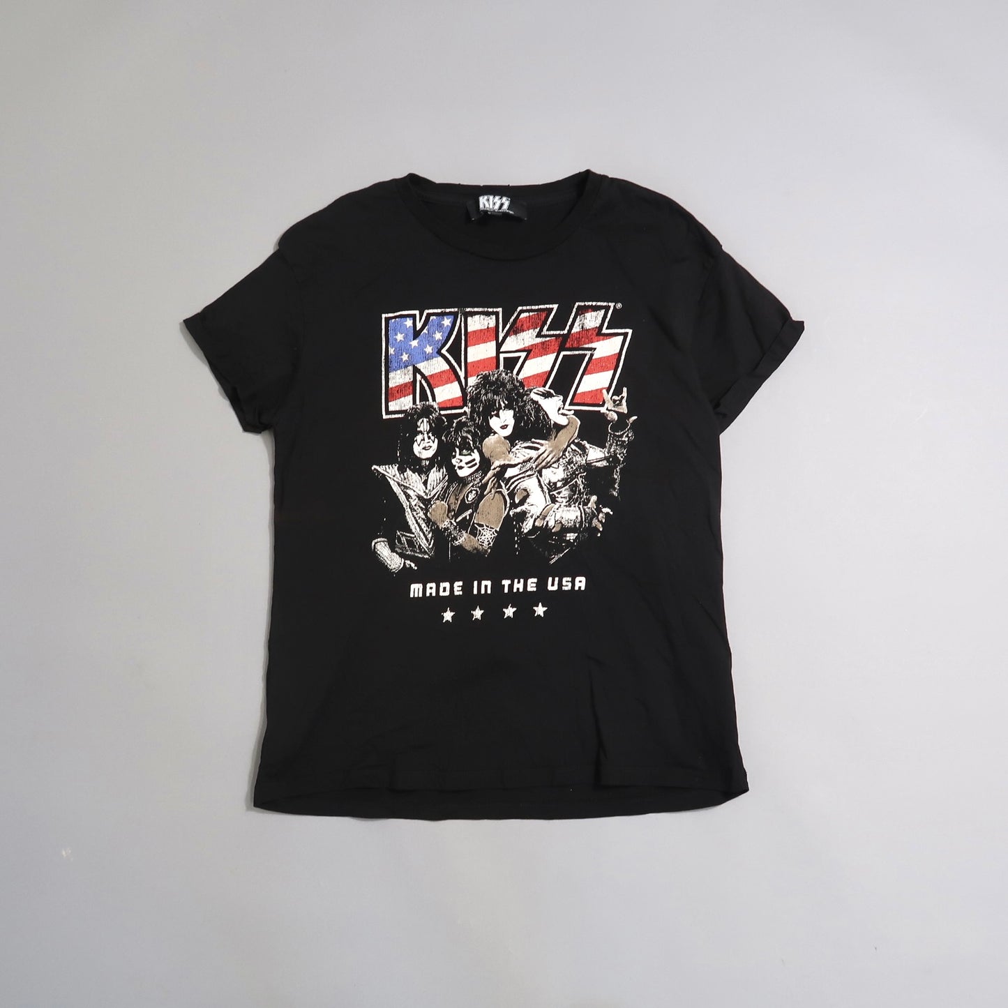 Black KISS T-shirt with band graphic and nullMade in the USAnull text.