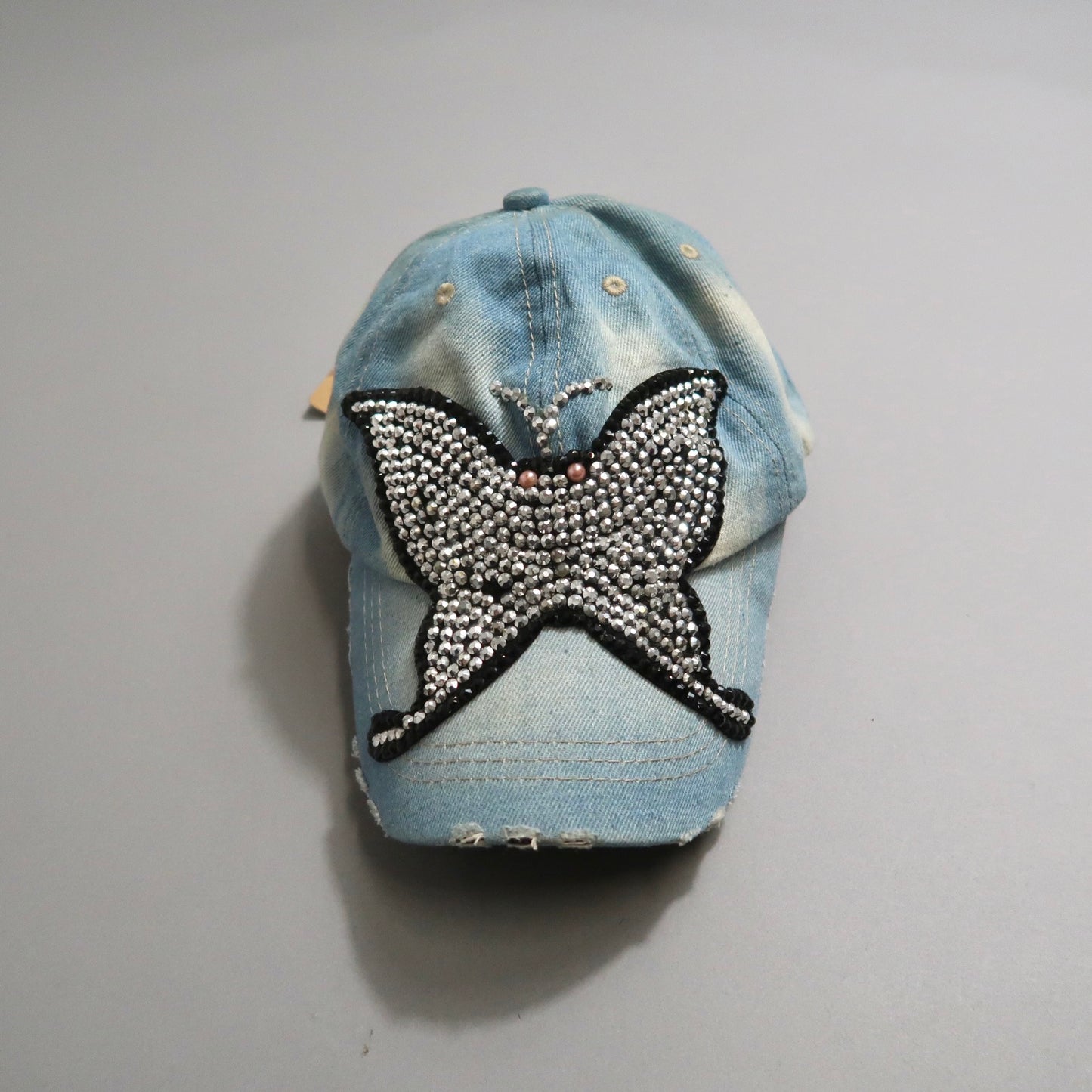 Butterfly cap