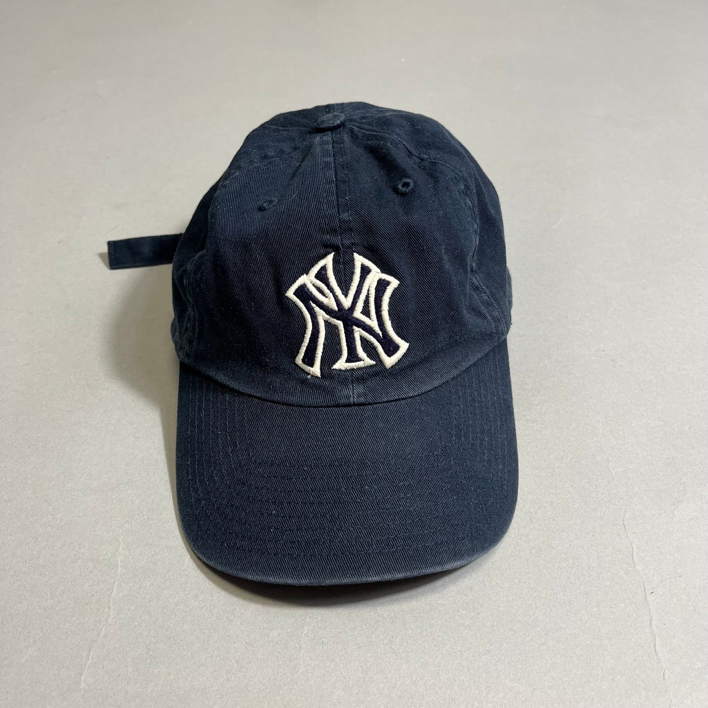 NY cap