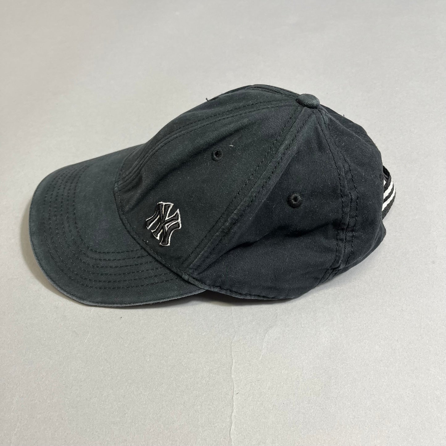 NY cap