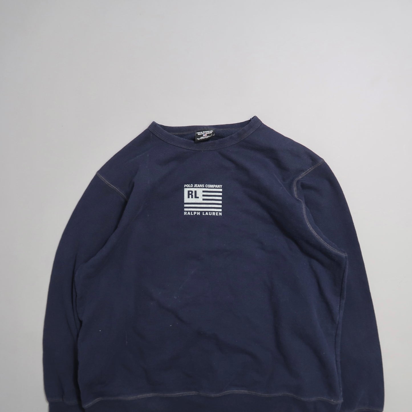 Navy blue sweatshirt with white nullPolo Jeans Companynull logo on front.