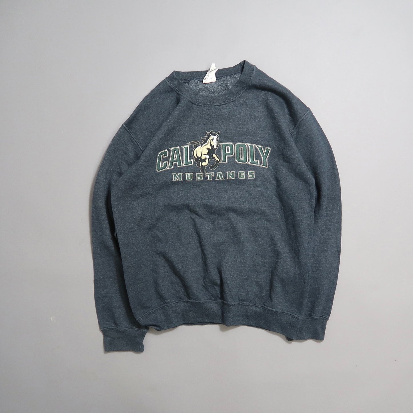 Dark grey Cal Poly Mustangs sweatshirt on a plain background.