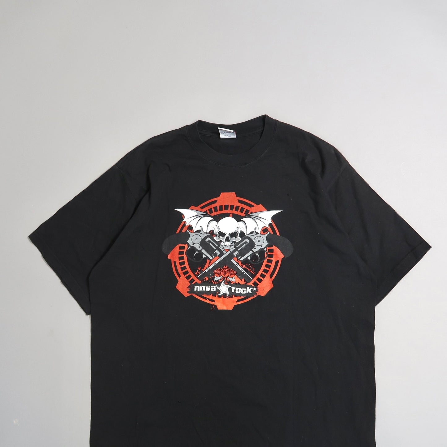 Black T-shirt with skull and guitars graphic, labeled nullNova Rock.null