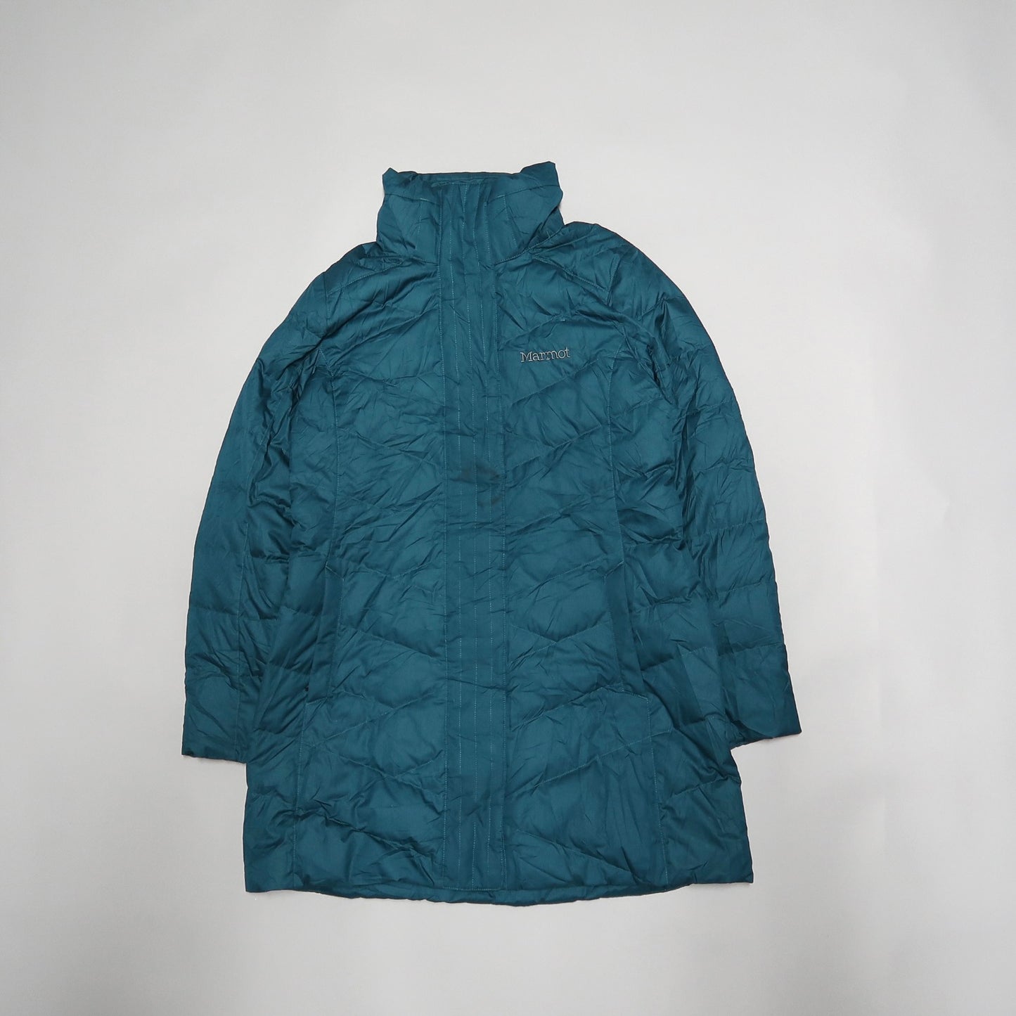 Teal puffer jacket with a high collar, laid flat on a white background.