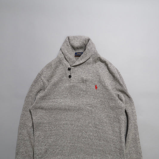 Gray collared sweater with three buttons and red logo embroidery.