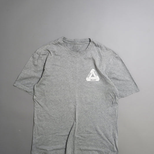 Gray T-shirt with triangular logo on the left chest.