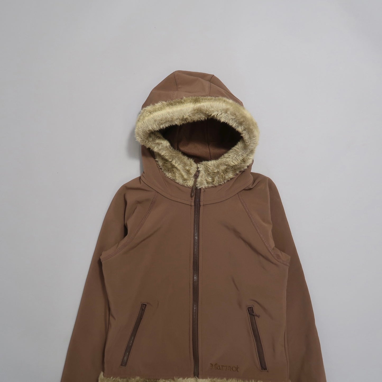Brown hooded jacket with fur trim on a plain background.