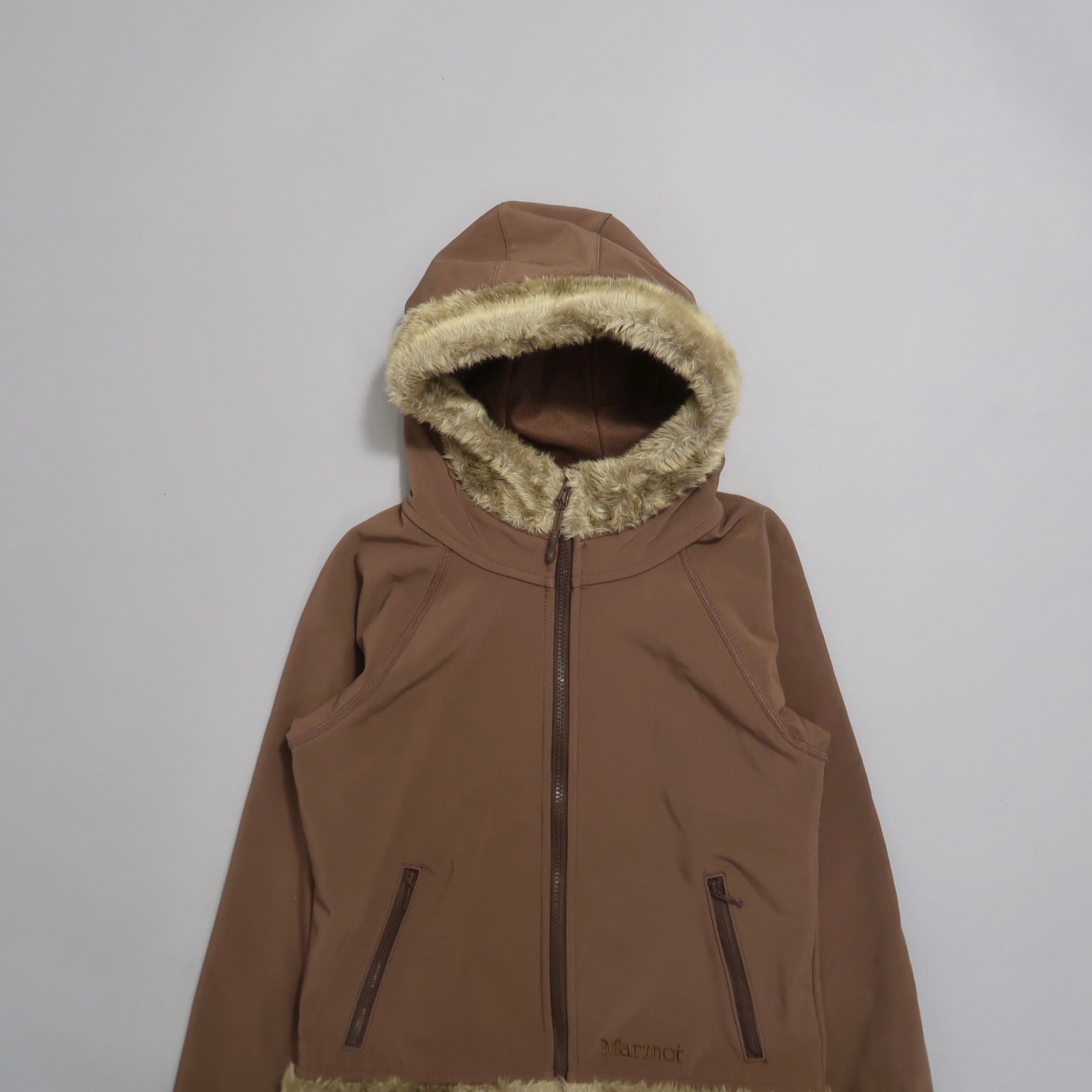 Brown hooded jacket with fur trim on a plain background.