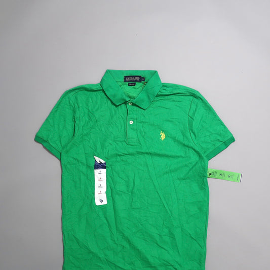 Green polo shirt with collar and logo, displayed with tags.