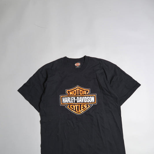 Black Harley-Davidson t-shirt with orange logo centered.