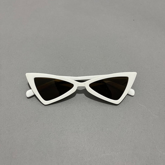 White, cat-eye sunglasses with dark lenses on a gray background.
