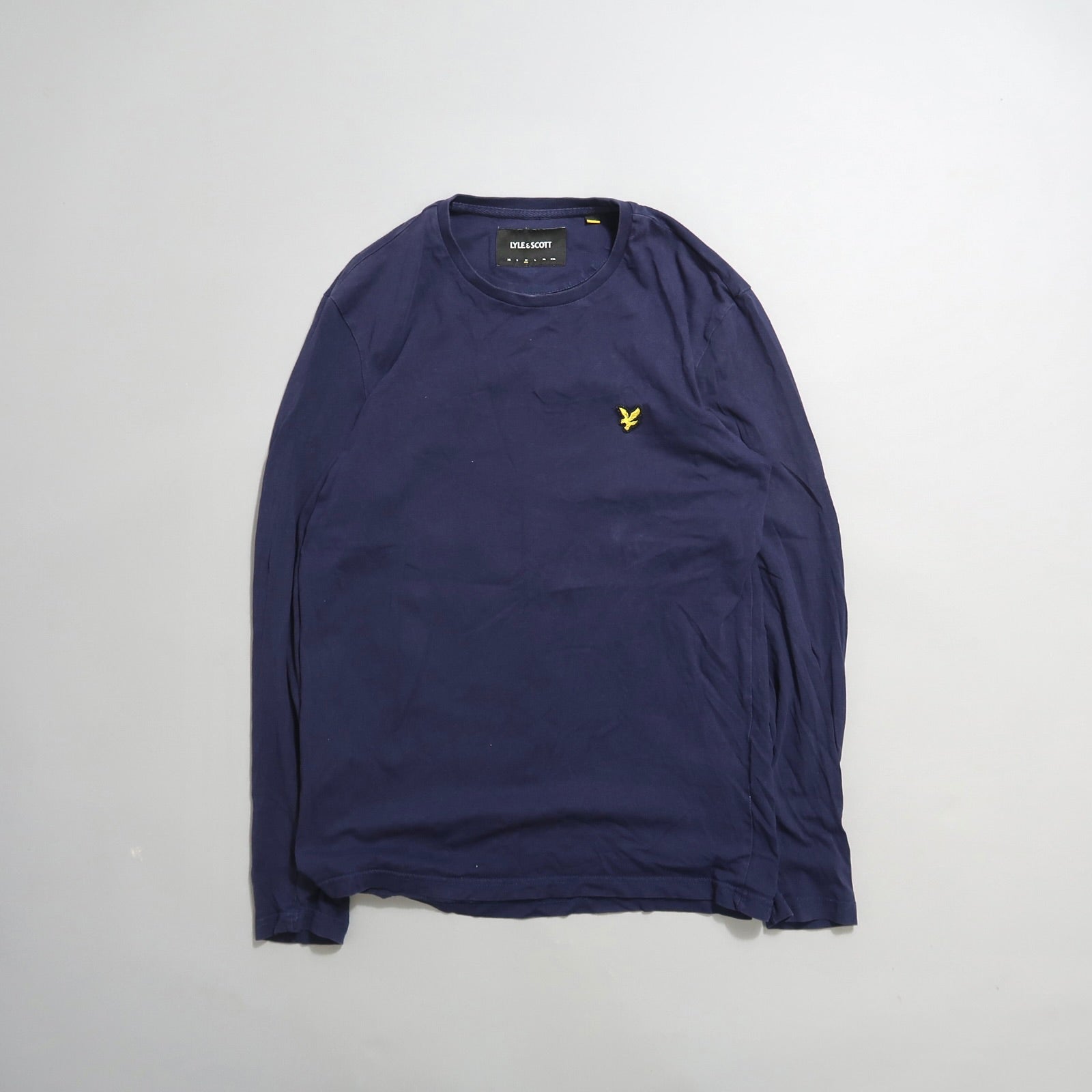 Navy long-sleeve shirt with a yellow embroidered logo.