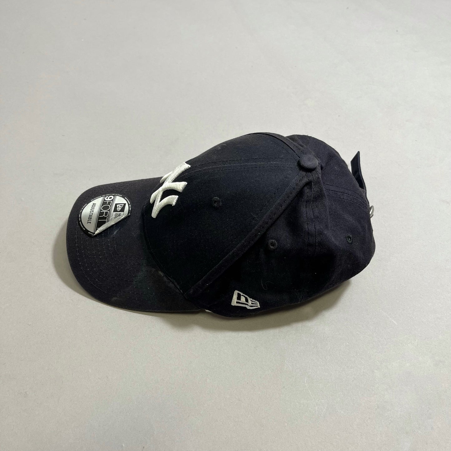 NY cap