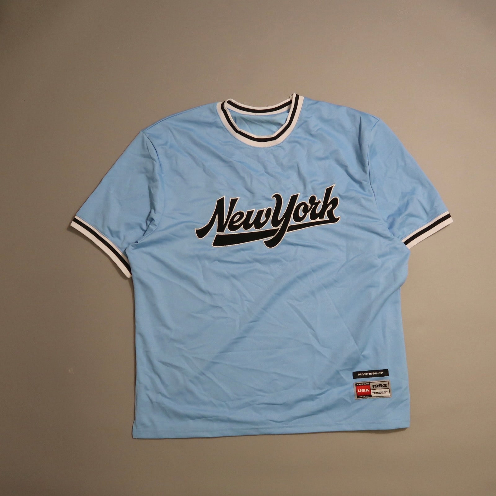 Light blue nullNew Yorknull jersey with black and white trim.