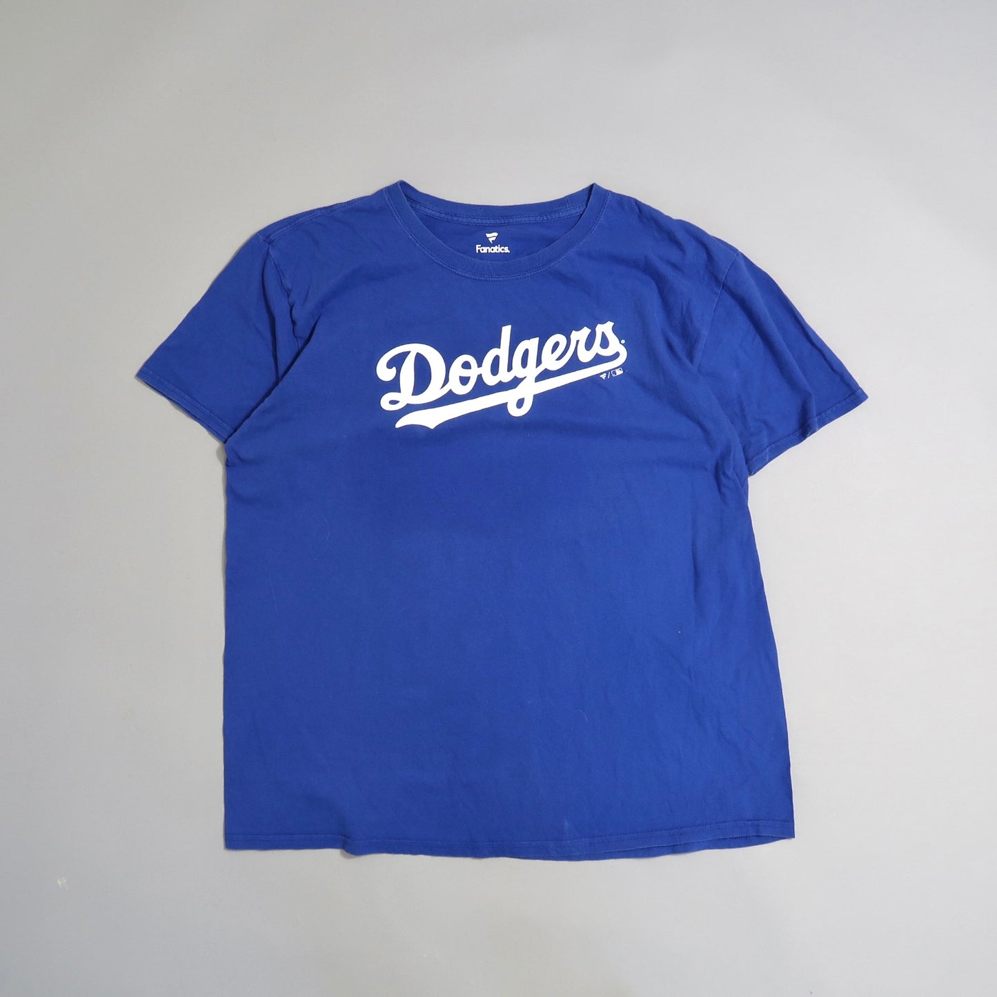 Blue Dodgers T-shirt with white lettering on a plain background.