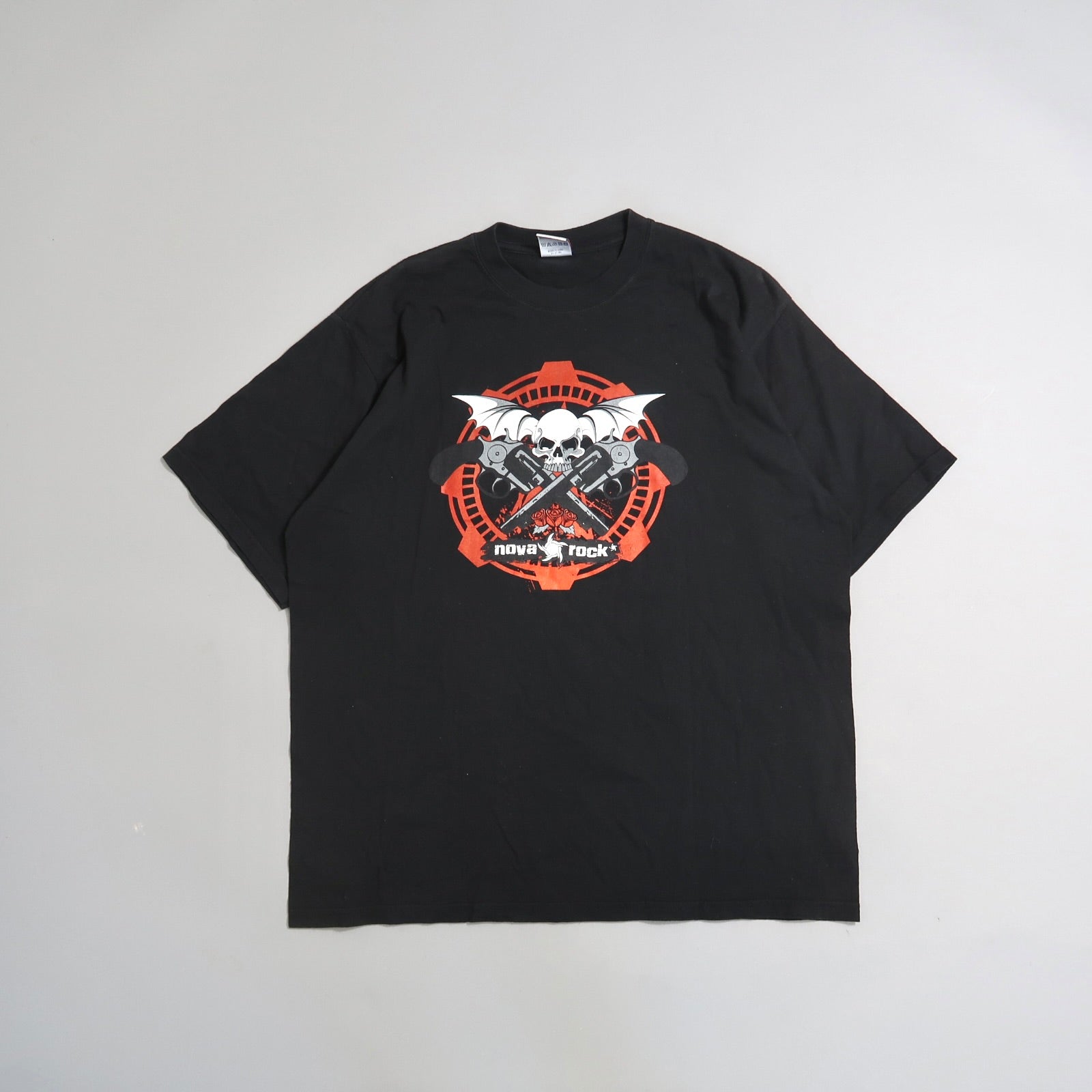 Black T-shirt with a skull and crossed guitars design.