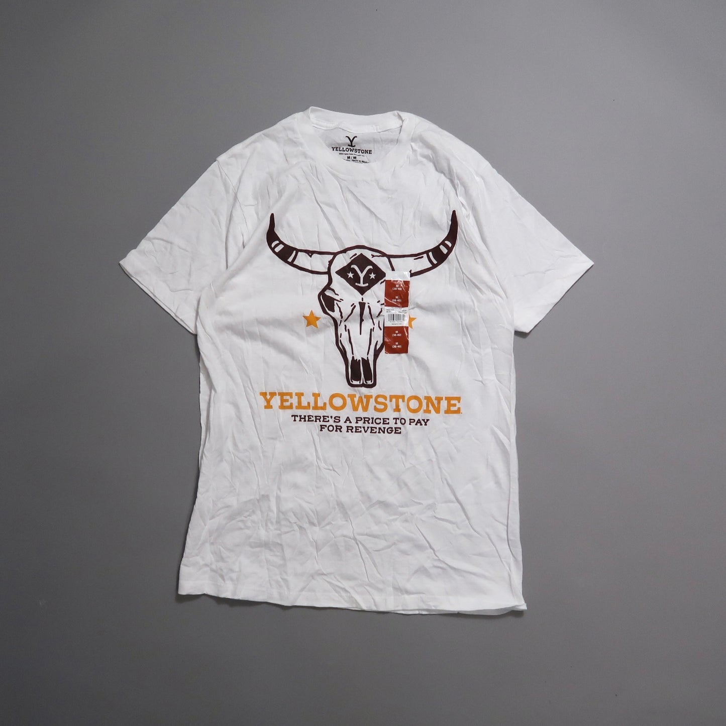 White T-shirt with nullYellowstonenull design featuring a bull skull.