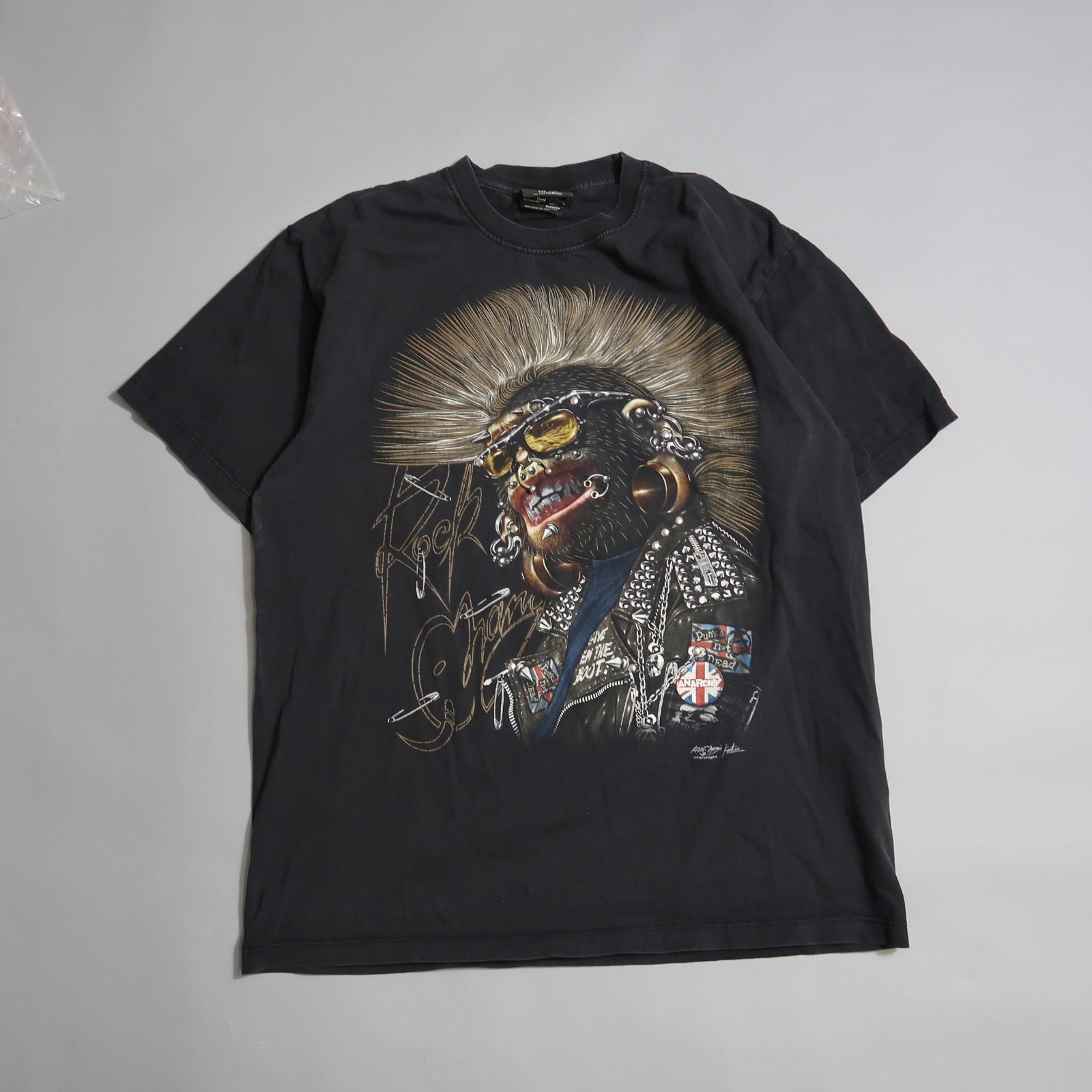 Black t-shirt with punk chimpanzee graphic and nullRock Starnull text.