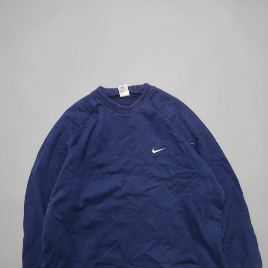 Blue Nike sweatshirt with logo on the front, white tag inside collar.