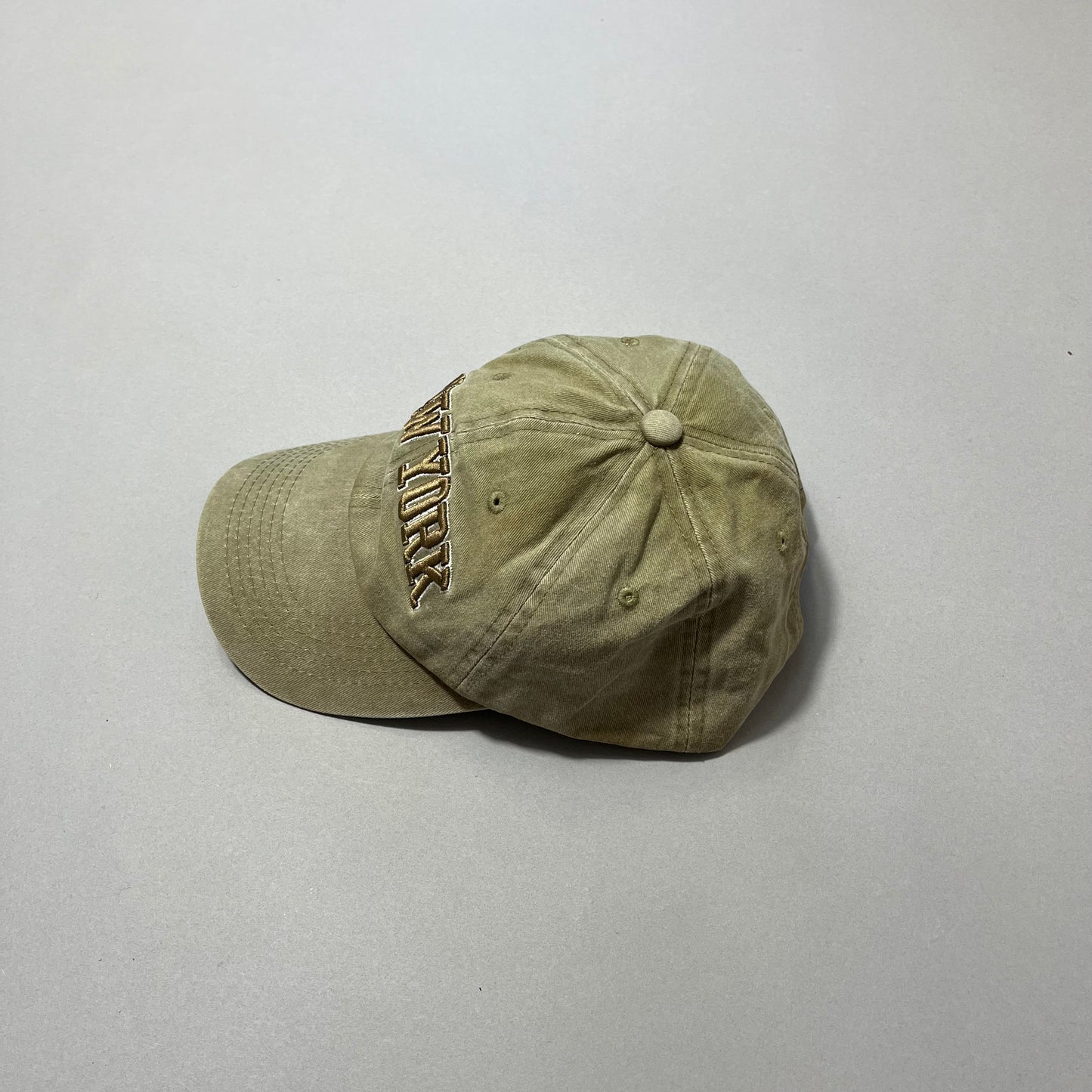 Khaki baseball cap with nullNew Yorknull embroidery.