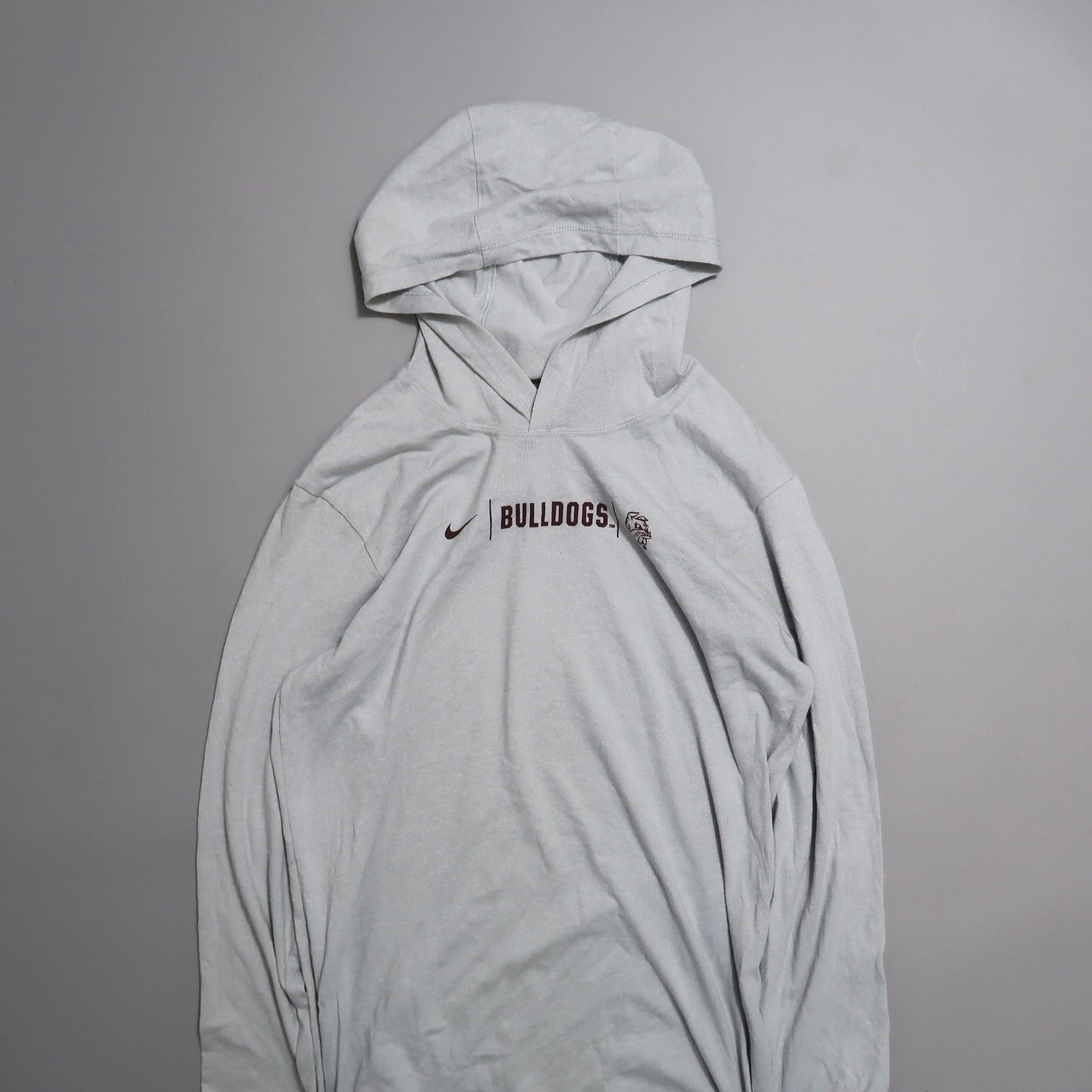 Gray hoodie with nullBulldogsnull and Nike logo on the chest.