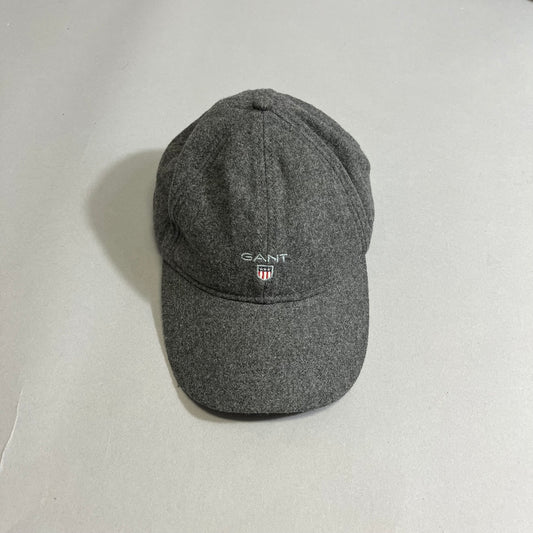 Gray GANT baseball cap on a light gray background.