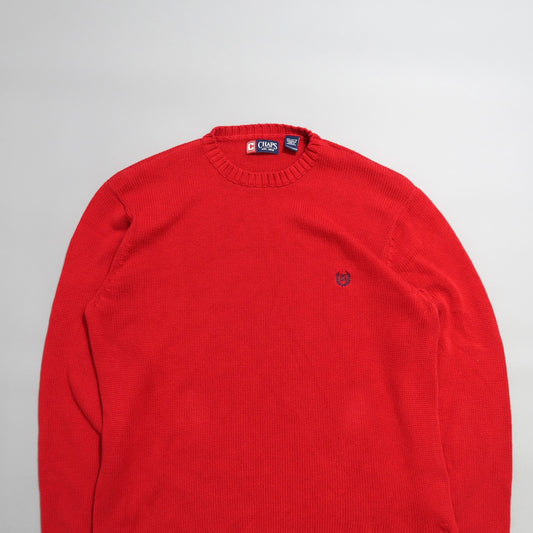Red crew-neck sweater with small embroidered logo on left chest.