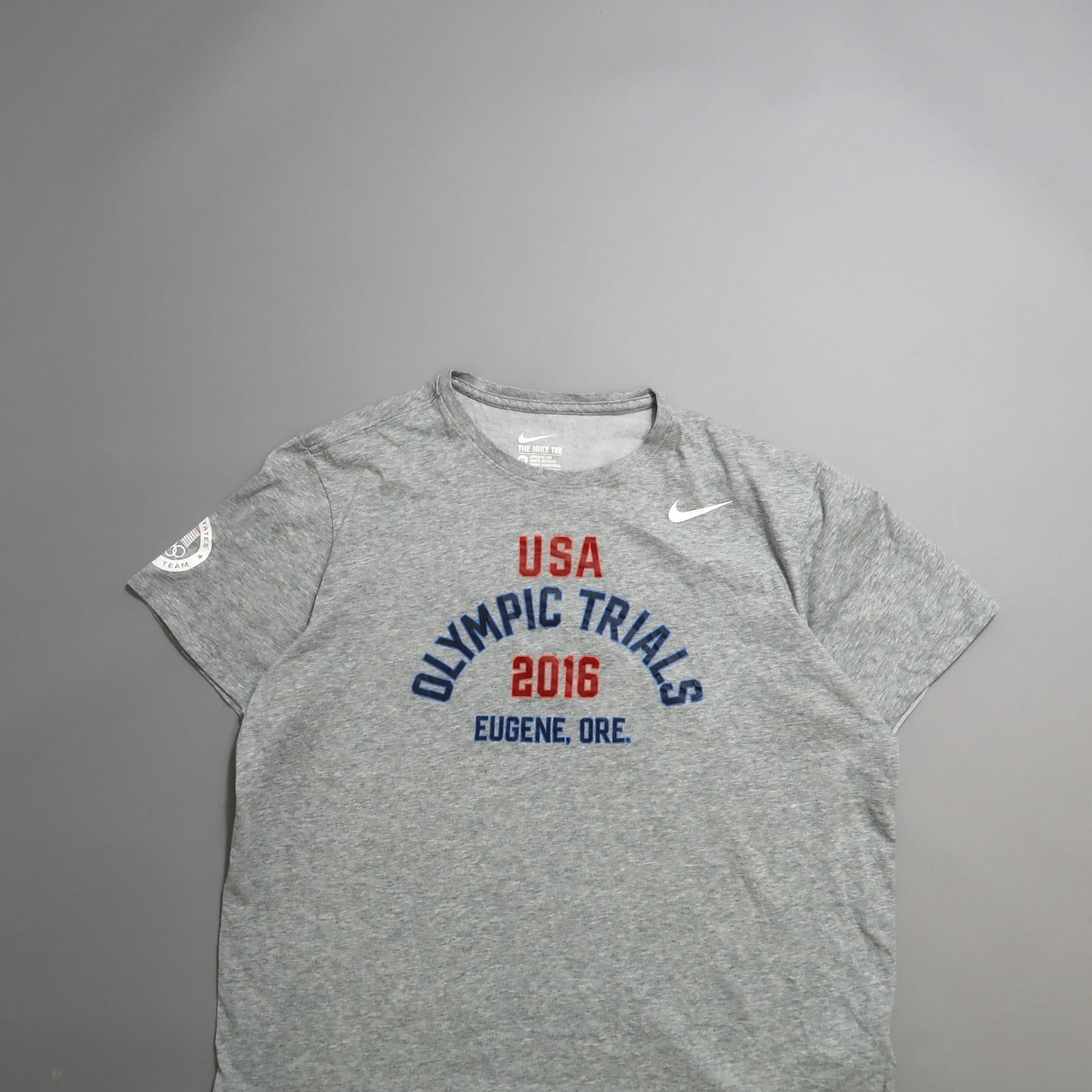 Gray nullUSA Olympic Trials 2016, Eugene, Ore.null T-shirt on gray background.