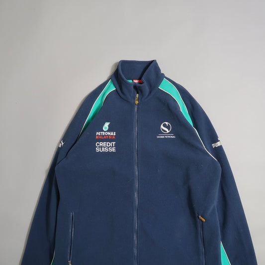 Blue Sauber Petronas jacket with sponsor logos on front and sleeves.
