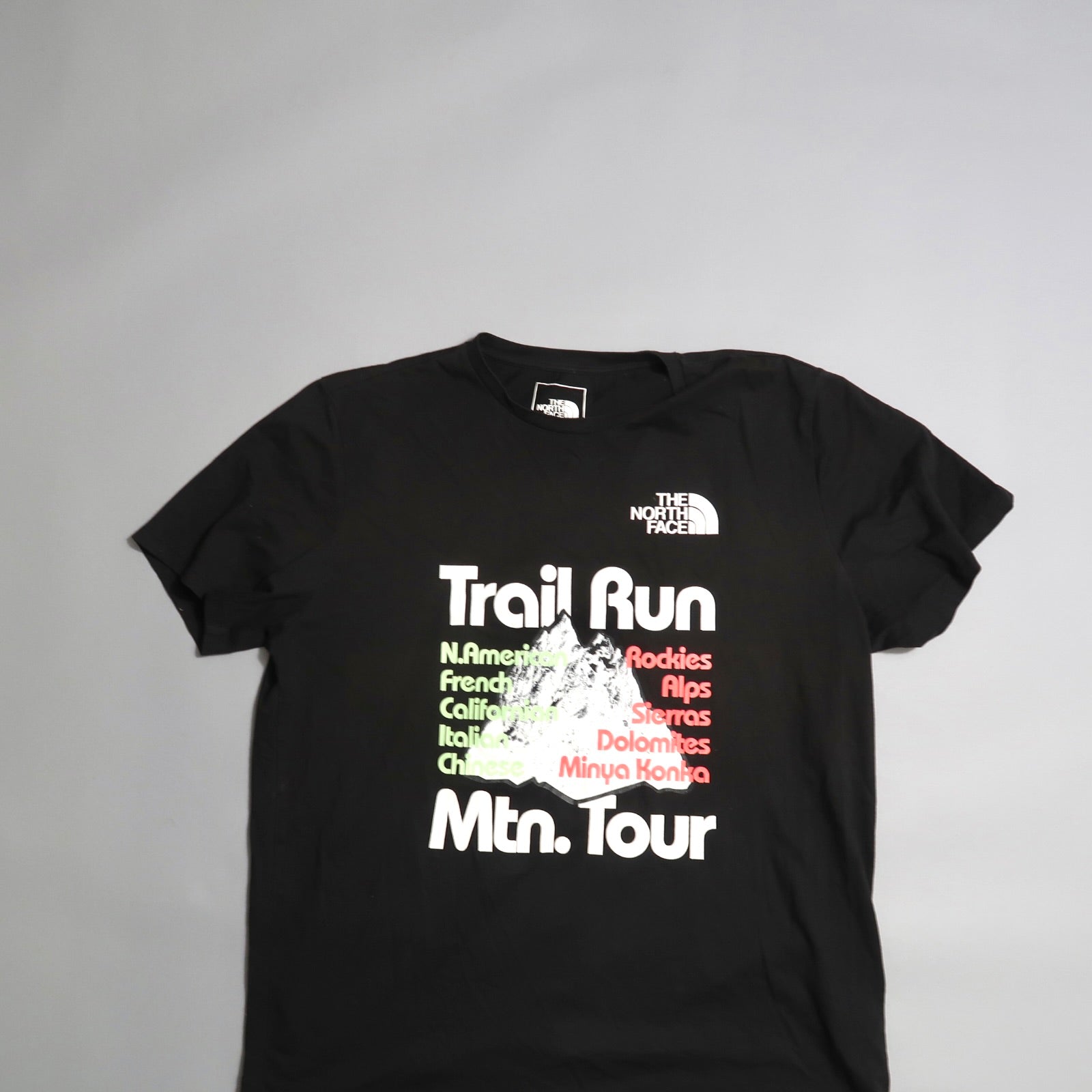 Black T-shirt with nullTrail Run Mtn. Tournull and mountain names design.