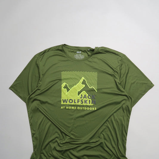 Green Jack Wolfskin T-shirt with mountain graphic design.
