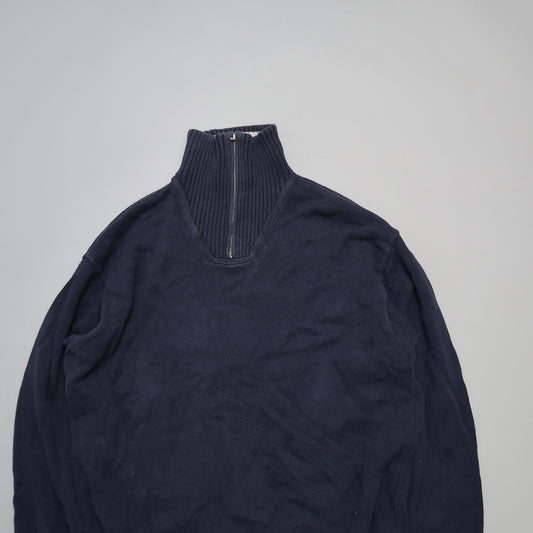 Navy blue half-zip pullover sweater on a plain background.
