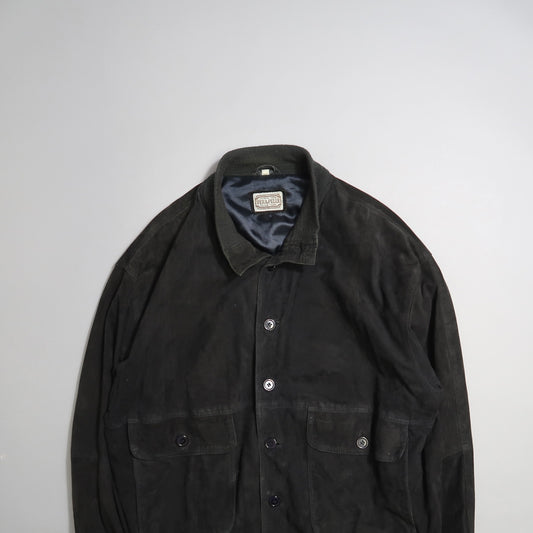 Dark buttoned leather jacket with two front pockets on a light background.