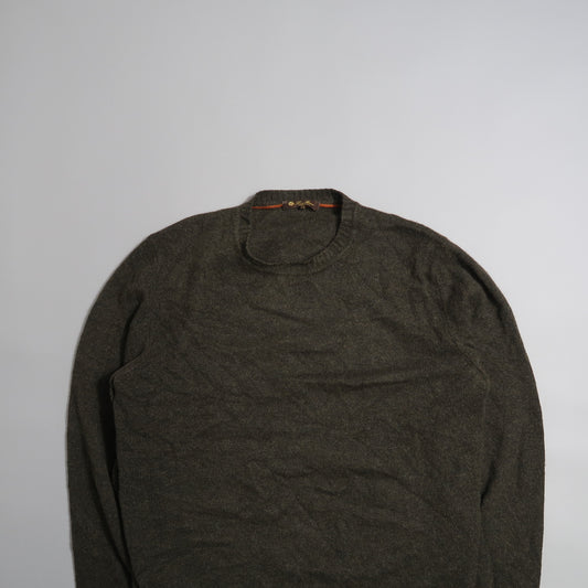 Dark gray sweater on a light gray background.