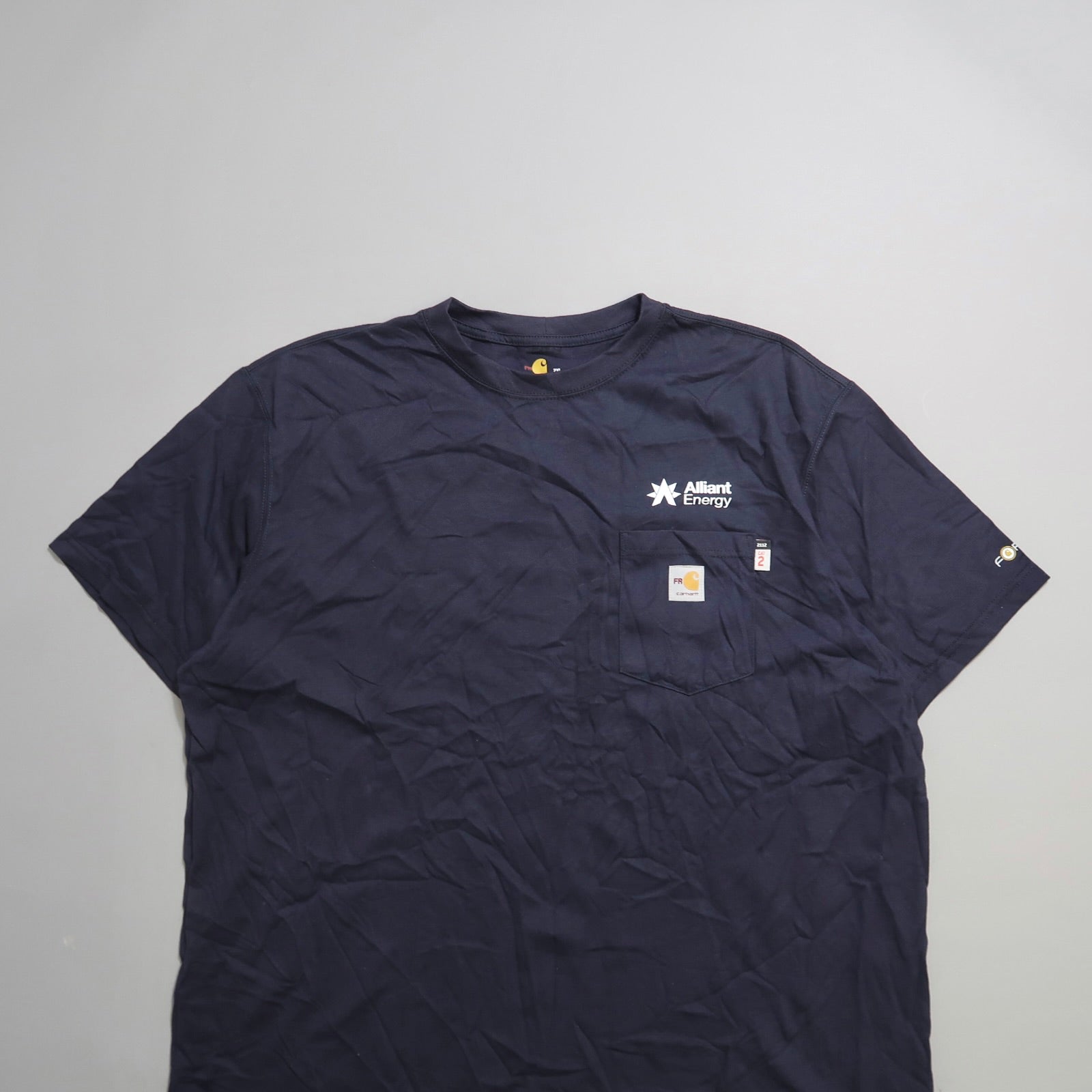 Navy blue t-shirt with Alliant Energy logo on the chest.
