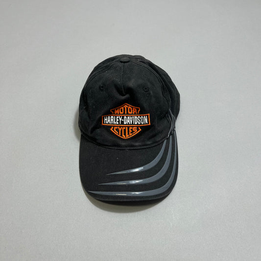 Black Harley-Davidson cap with logo and silver stripes.