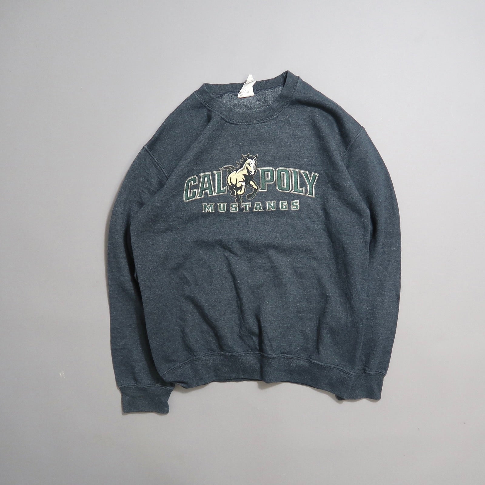 Dark grey Cal Poly Mustangs sweatshirt on a plain background.