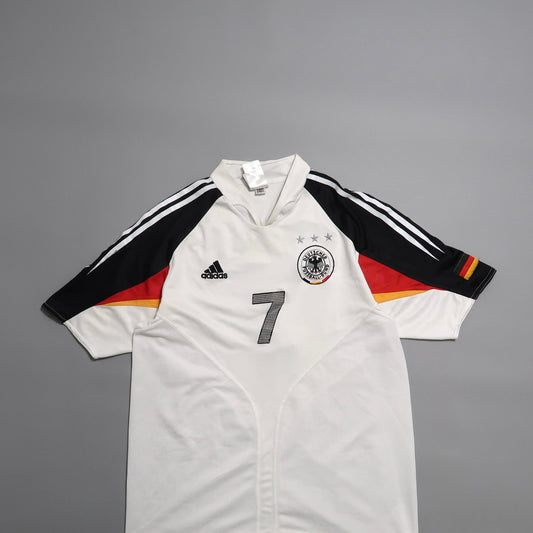 White Germany soccer jersey with number 7 and Adidas logo.